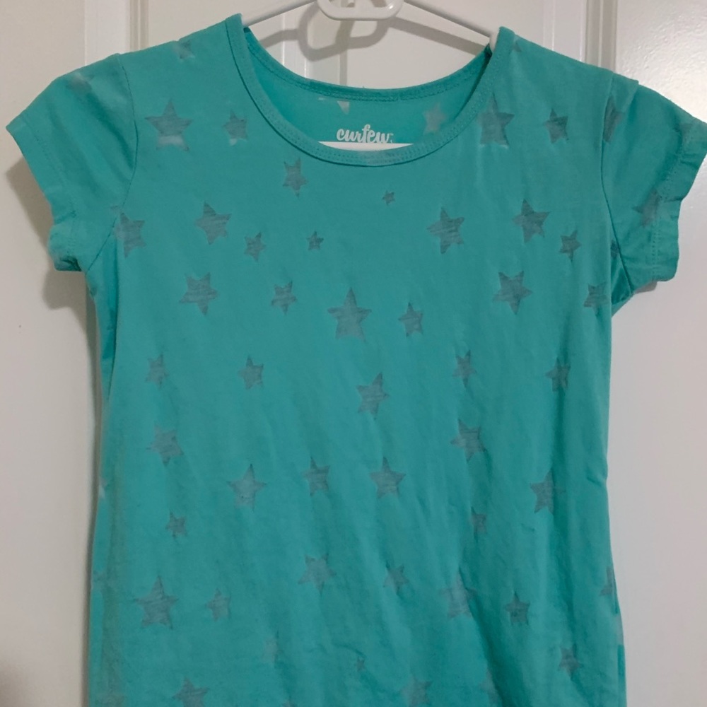 Light teal T-shirt with see-through stars